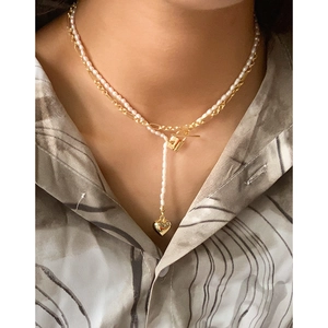 Double-layer S925 silver necklace with white pearls and a golden heart lock charm