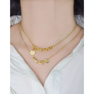 Double-layered gold chain necklace with round disk pendant and rose charm for women
