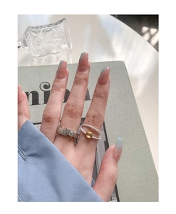 Détails de bagues en argent S925 avec texture irrégulière et perle dorée
