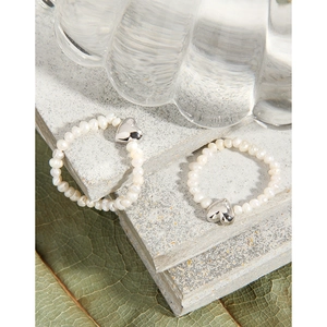 Elegant set of two S925 silver heart pearl rings with natural white beads and polished finish