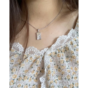 S925 sterling silver geometric pendant necklace with micro-set zircon on model