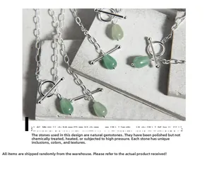 Macro detail of natural green aventurine teardrop pendant with S925 silver OT buckle