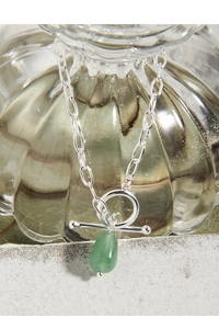Detail of silver S925 chain with green aventurine pendant and OT toggle clasp closure