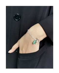 Close-up of S925 silver toggle clasp bracelet with green aventurine teardrop pendant