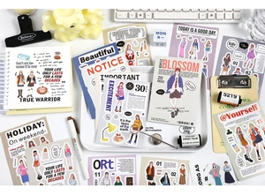 Detailed close-up of romantic daily series deco stickers and cards for DIY journaling