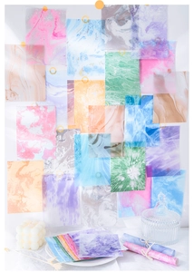 Artistic display of marble textured translucent decorative papers for journal DIY