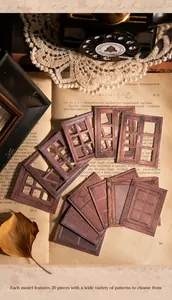 Detailed view of vintage hollow window frame paper stickers for scrapbook decoration