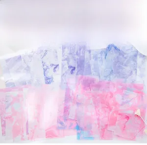 Close-up of semi-transparent marble texture decorative paper for journaling and crafts