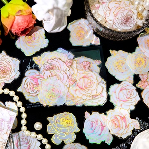 Holographic rose stickers with gold foil detailing for DIY journaling and crafts
