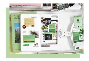 Detailed view of aesthetic Korean stickers with UI design elements and white binder clip