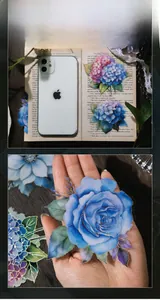 Detailed view of large blue floral stickers with gold foil edges and PET texture