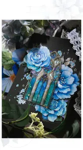 Detailed view of blue rose stickers with holographic foil on a vintage collage background