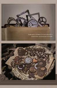 Close-up of vintage steampunk scrapbook kit with clock gears and hollow frame motifs