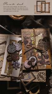 Detailed view of steampunk scrapbooking stickers with vintage gears and clock patterns