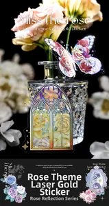 Macro detail of laser gold rose stickers with iridescent butterfly and gothic window motifs