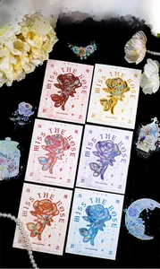 Macro view of vintage PET rose stickers with gold laser foil and elegant flower patterns