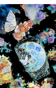 Detail of DIY floral PET stickers with gold foil edges on a decorative glass bottle