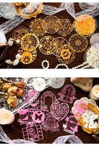 Detailed laser-cut paper scraps featuring gold magic circles and pink floral lace patterns