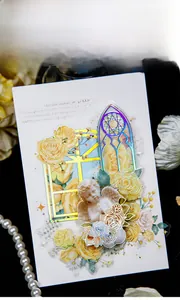Detail of vintage rose stickers featuring gold foil angels and window designs for journaling
