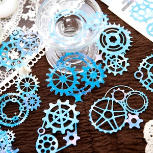 Blue watercolor hollow gear stickers for scrapbooking on vintage fabric background