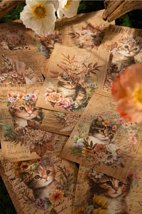 Λεπτομέρεια από vintage χαρτιά scrapbooking με γάτες, στεφάνια λουλουδιών και βρύα