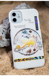 Detailed view of white PET sticker on phone case featuring a cosmic cat and galaxy design