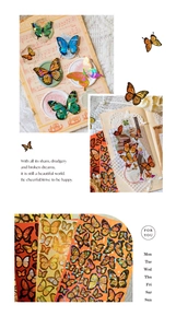 Close-up of vintage butterfly stickers with holographic gold foil on retro junk journal