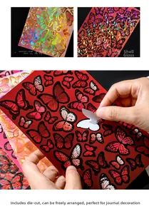 Close-up of holographic gold-stamped butterfly stickers for DIY scrapbooking decor