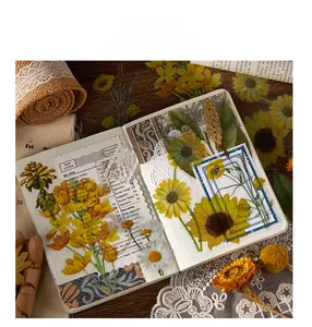Detail of yellow sunflower and daisy floral stickers for vintage journaling scrapbooks