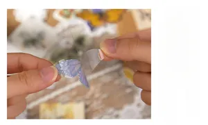 Detail of waterproof PET butterfly sticker with transparent backing and precise die-cut edges