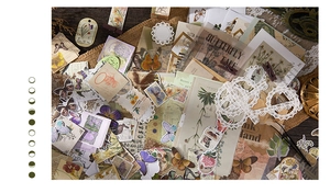 Flat lay of vintage butterfly and floral paper stickers for DIY scrapbooking projects