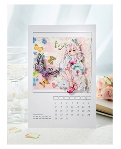 Detailed view of floral scrapbooking card featuring anime girl and butterfly designs