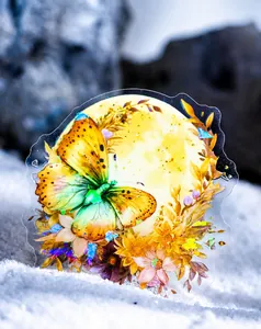 Macro detail of PET sticker with 3D crystal texture featuring a yellow butterfly and floral art