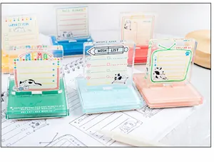 Detailed view of cat-themed acrylic memo boards with pastel bases and cute illustrations