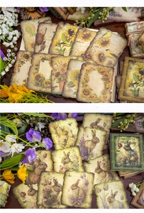 Macro shot of vintage style paper stickers with sunflower and rabbit floral patterns