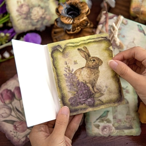 Vintage floral scrapbooking paper with rabbit motif and burnt edge detail, 50 sheets set