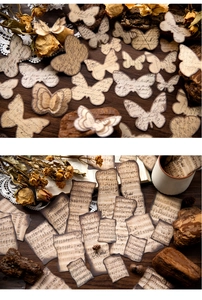 Dettaglio di farfalle vintage e spartiti musicali invecchiati per scrapbooking fai-da-te