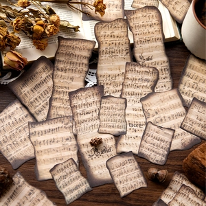 Carta per scrapbook spartito musicale retrò con bordi bruciati su legno rustico