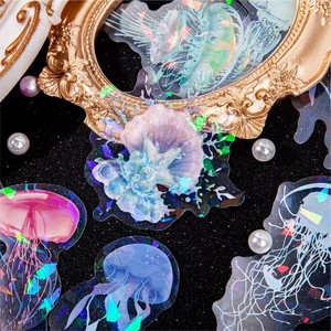 Holographic jellyfish stickers with iridescent finish on luxury baroque background