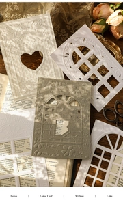Detailed close-up of retro hollow relief paper with vintage floral and window cutouts