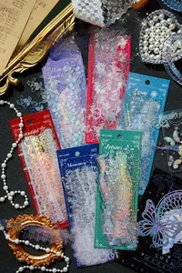 Macro detail of PET sticker with silver foil and white ink lace patterns on vintage desk