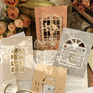 Vintage laser-cut paper scrapbooking material with intricate hollow lace designs