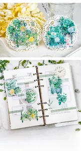 Close-up of floral PET stickers with silver foil for scrapbooking and DIY journals