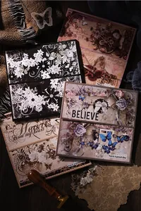 Macro shot of vintage scrapbooking paper with floral and cupid art prints for DIY crafts
