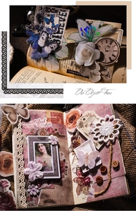 Macro view of vintage junk journal supplies with lace and floral scrapbooking stickers