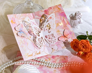 Detail of 3D hollow butterfly card with gold stamping and Good Luck greeting