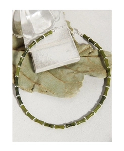 Detailed shot of green bamboo-shaped jade beads with S925 silver spacers and clasp