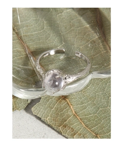 Detailed view of the S925 sterling silver hallmark on the adjustable ring band