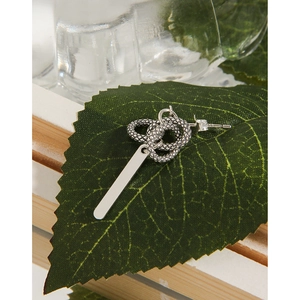 S925 sterling silver snake texture hoop earring with long drop bar on green leaf