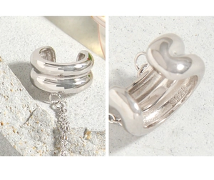 Macro shot of S925 sterling silver stamp on minimalist double band chain ear cuff